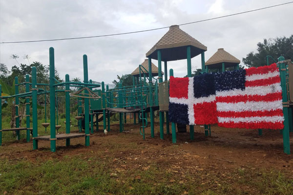 A playground promotes the Dominican Republic and U.S. flags
