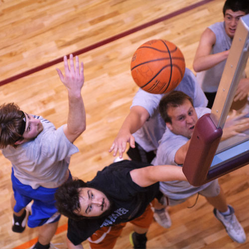 students playing basketball